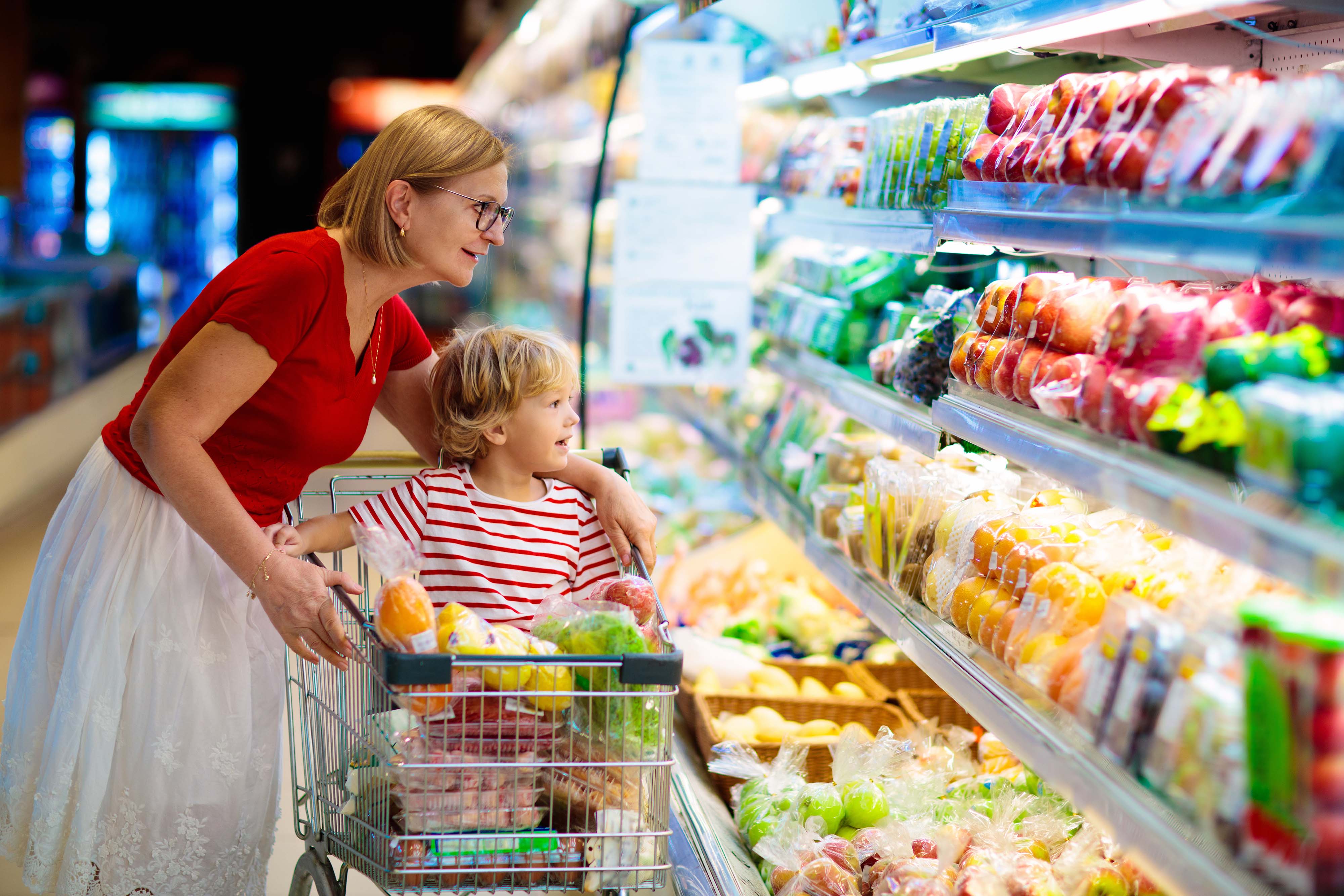 A family getting groceries from a supermarket